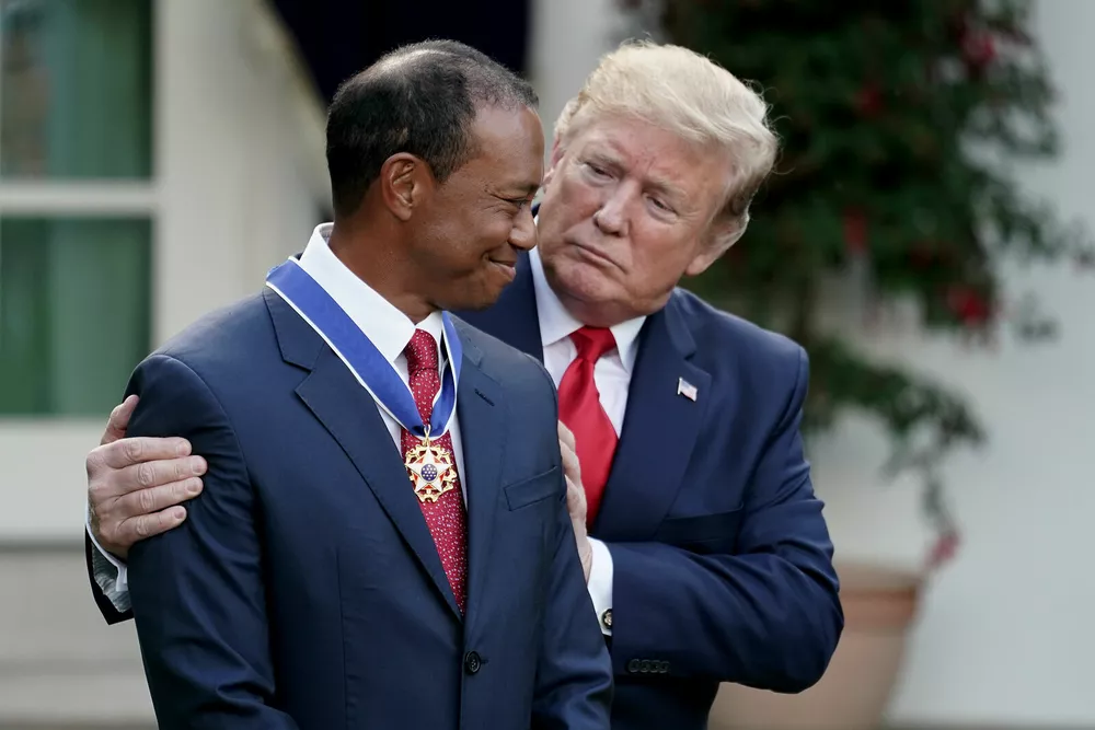 Дональд Трамп и Тайгер Вудс
